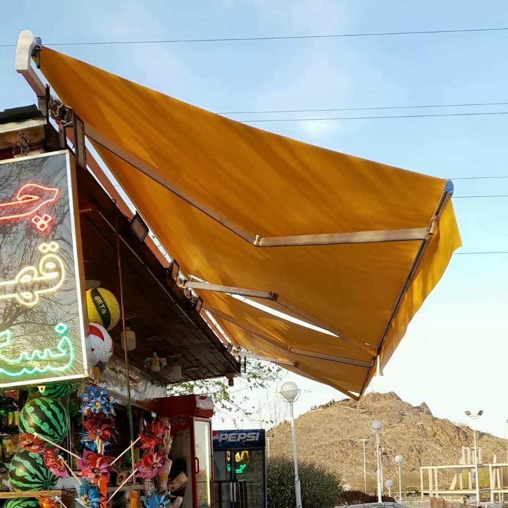 سایبان برقی با پارچه مقاوم در برابر UV و باران سایبان برقی با پارچه مقاوم در برابر UV و باران