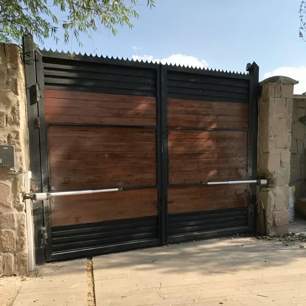 جک درب پارکینگی با موتور قدرتمند و بدنه مقاوم مشخصات فنی مهم جک درب پارکینگی
