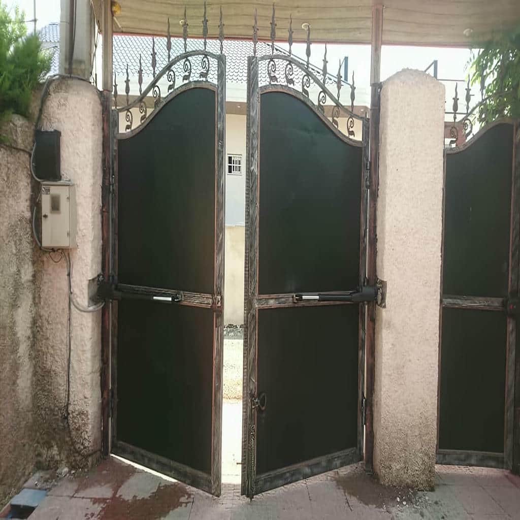 سفارش درب برقی پارکینگ ریلی برای دهانه عریض