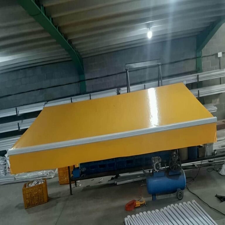 سایبان برقی کرم بالای ویترین پارچه فروشی استان اردبیل